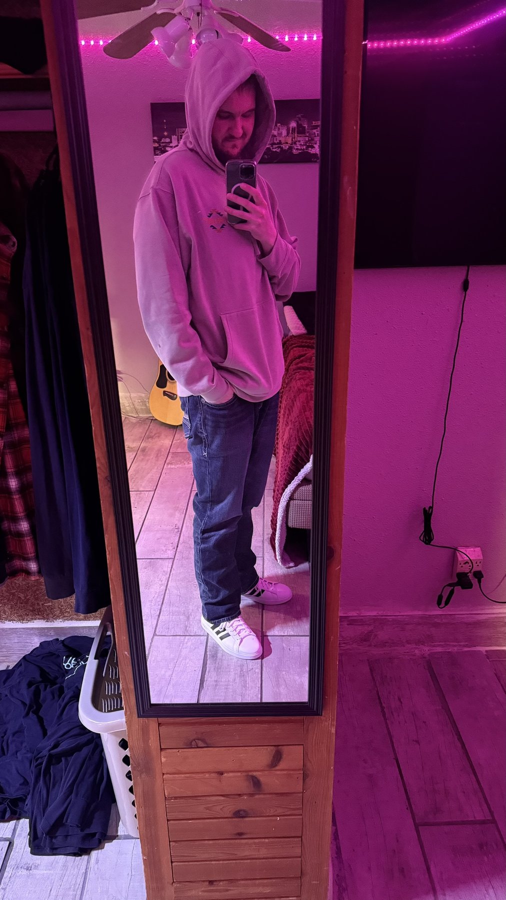 Jakob in a hoodie taking a mirror photo